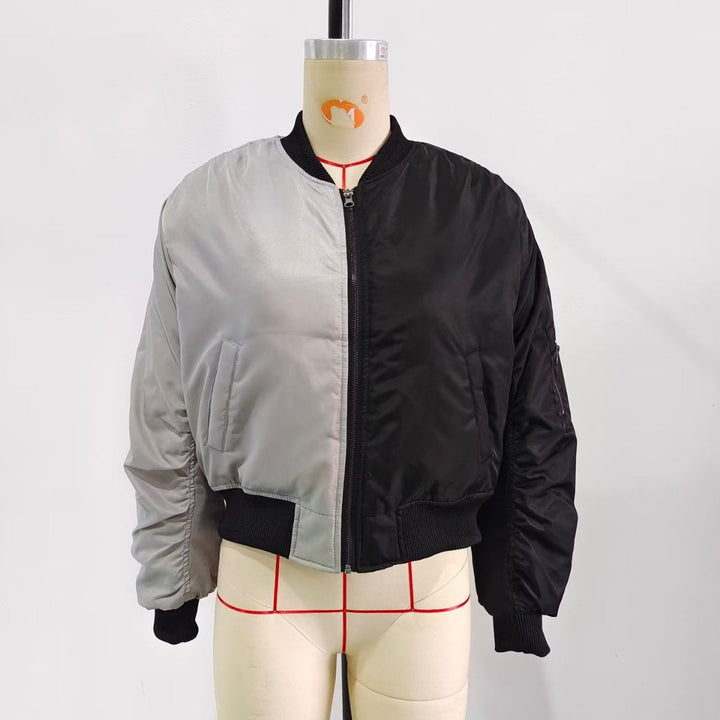 Women's two-tone bomber jacket with reversible look, zipper, arm pocket, and ribbed hem Mune Fashion