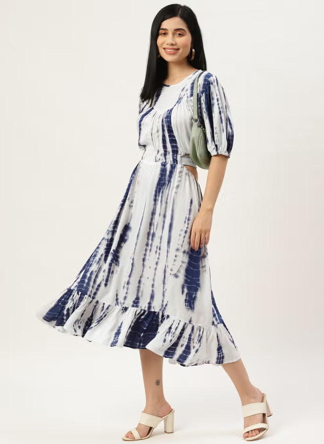 Women’s midi dress with tie-dye print, fitted cut, side cut-out, and ruffled hem.