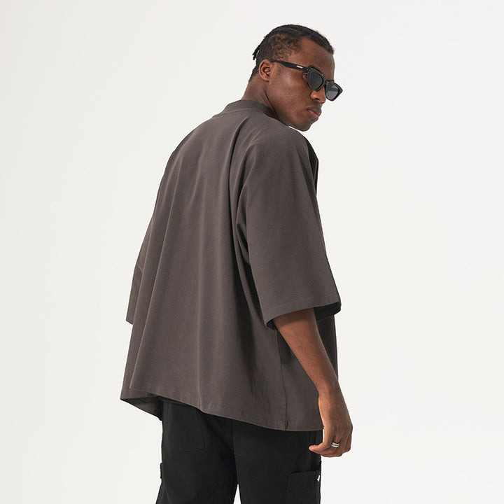 Unisex Oversize Boxy T-Shirt made of heavy cotton with a loose fit and extended sleeves Mune Fashion