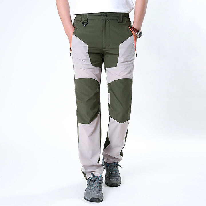 Men's functional trekking pants with reinforced knees, elastic waistband, and zipper pockets.