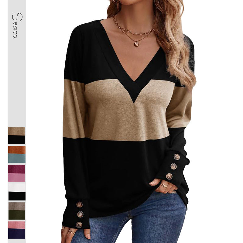 Women's fine knit pullover with V-neck, color block and decorative button cuffs Mune Fashion