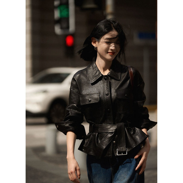 Women's short jacket made of textured leather with waist belt and press studs Mune Fashion
