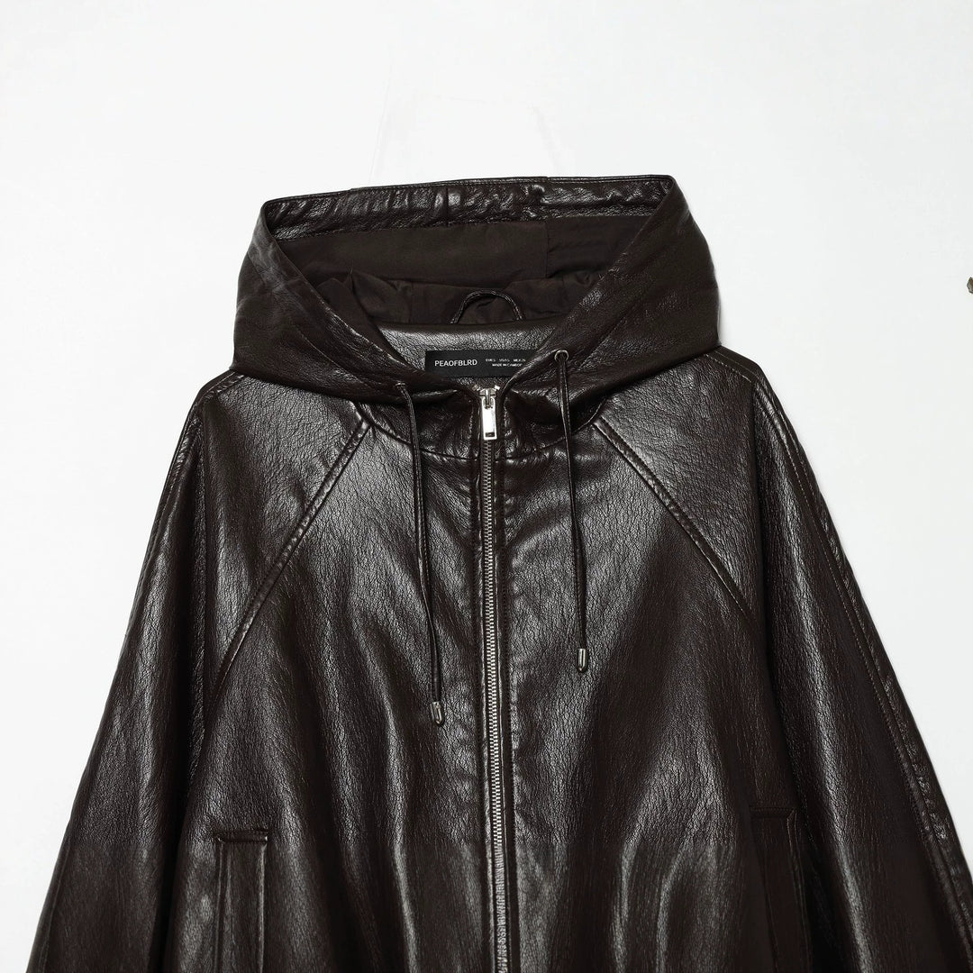 Women's short faux leather bomber jacket with hood, zipper and elastic hem Mune Fashion