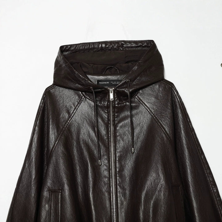 Women's short faux leather bomber jacket with hood, zipper and elastic hem Mune Fashion