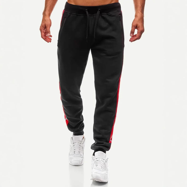 Men's narrow tapered fleece jogging pants with two-tone side piping and water-repellent zip pockets Mune Fashion
