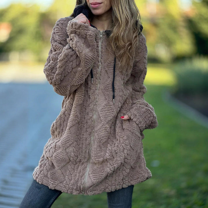Women's oversized teddy coat jacket with contrasting hood, zipper, and side pockets Mune Fashion