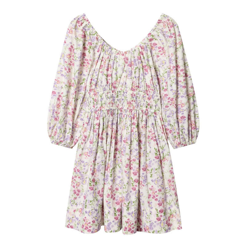 Women's floral dress with smocked waist and voluminous puff sleeves Mune Fashion