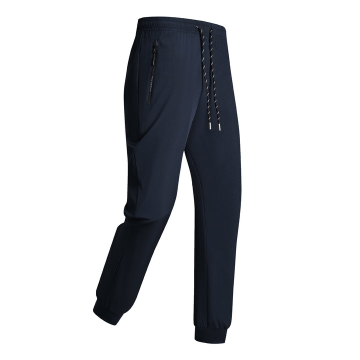 Men's sporty training pants with elastic waistband and zippered pockets Mune Fashion