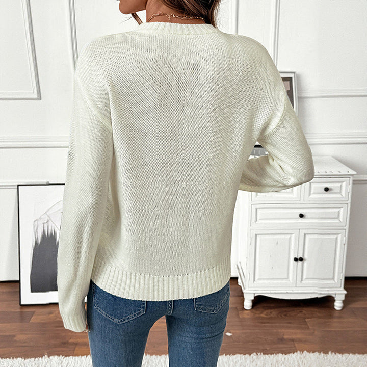 Ladies fine knit pullover with embroidered flower applications and round neckline Mune Fashion