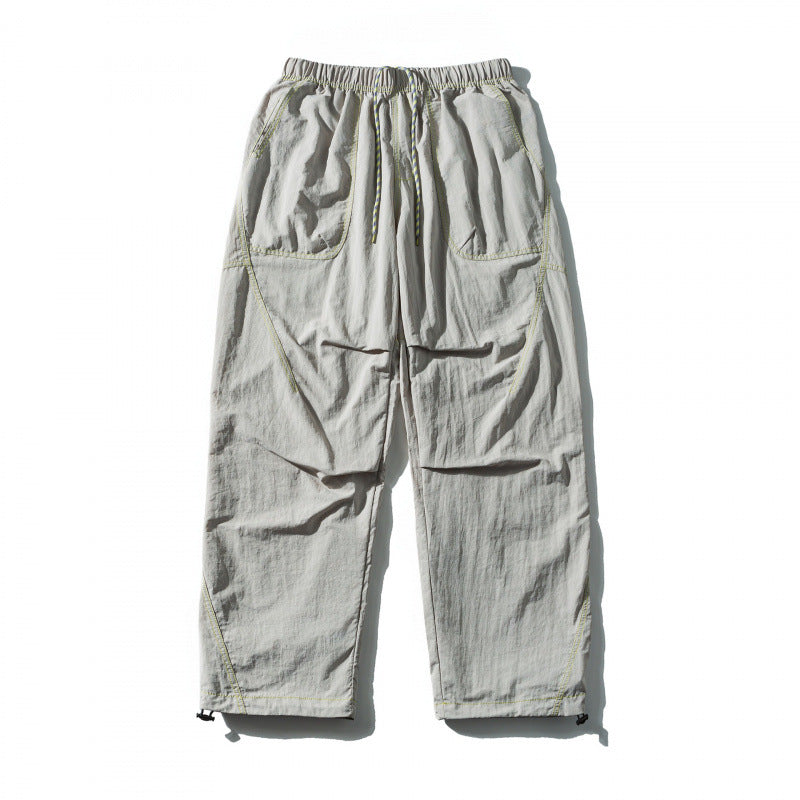 Unisex Loose-fitting outdoor pants with elastic waistband, drawstring, and adjustable leg cuffs Mune Fashion