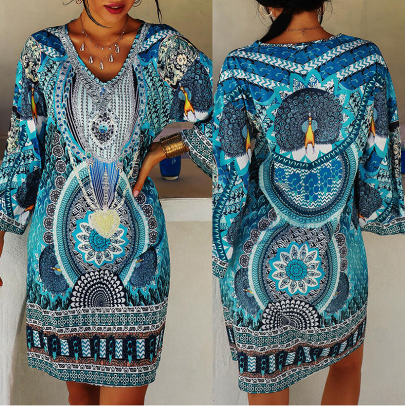 Women's short holiday tunic dress in kaftan style with V-neck and flared kimono sleeves Mune Fashion