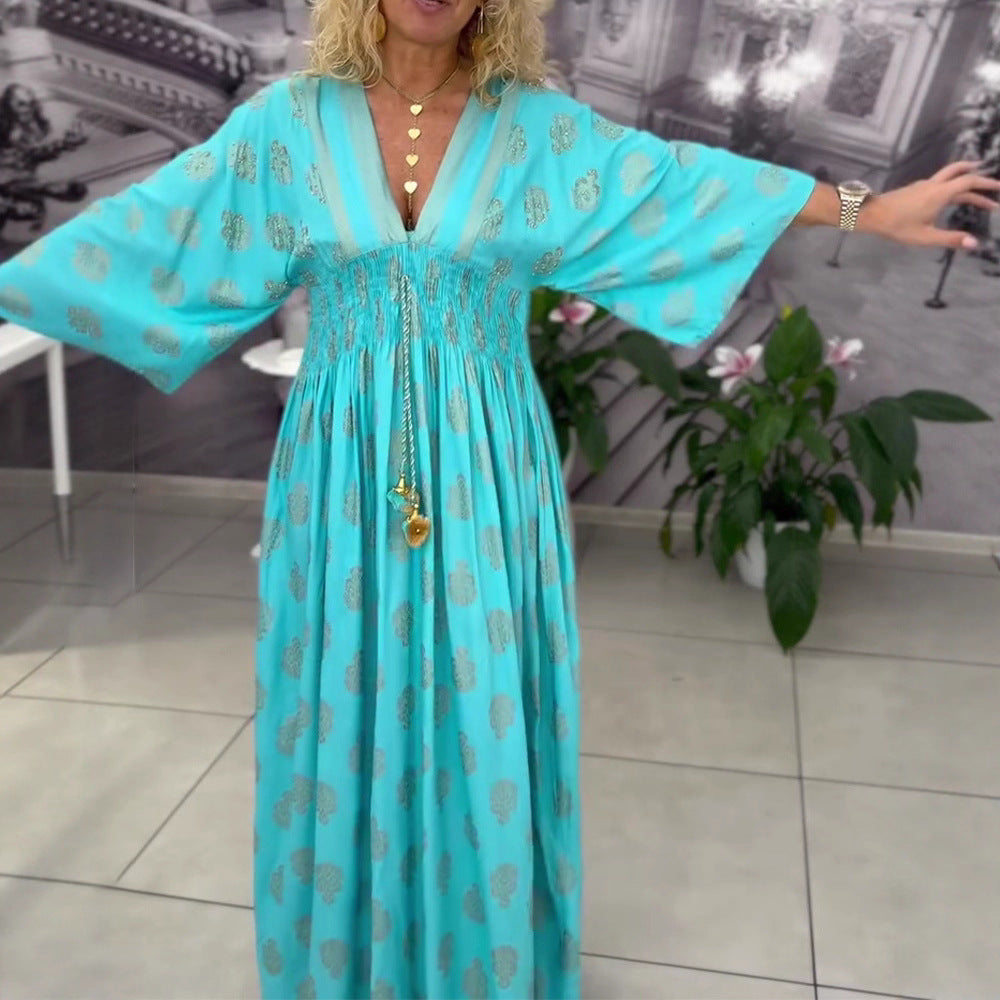 Women's gathered maxi dress with smocked waist, kimono sleeves, and decorative tassel Mune Fashion