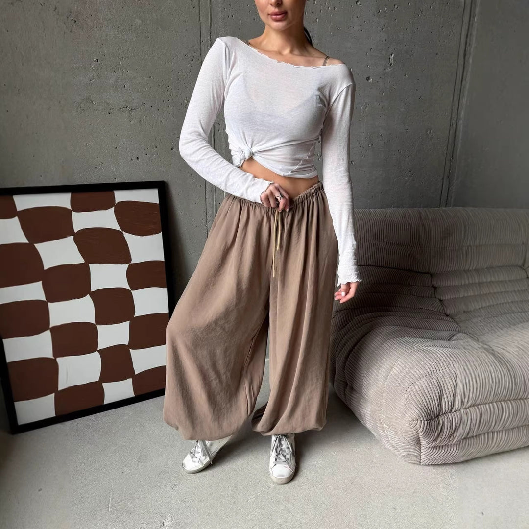 Women's wide harem balloon pants with high elastic waistband, drawstring, and casual wide fit.