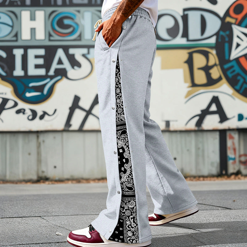 Men's loosely cut snap-front jogging pants with paisley side insert and elastic comfort waistband Mune Fashion