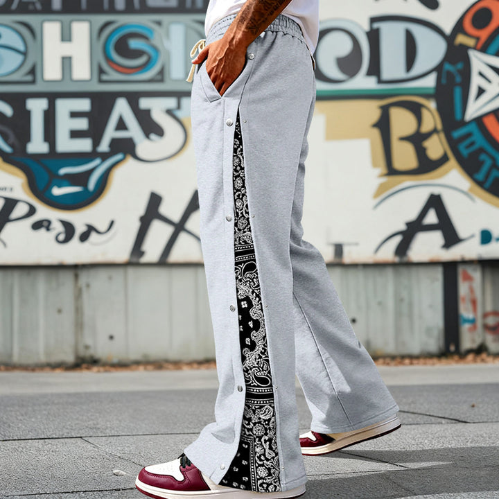 Men's loosely cut snap-front jogging pants with paisley side insert and elastic comfort waistband Mune Fashion