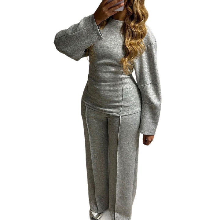 Women's soft lounge set with fitted sweatshirt, sculpting seam details, and wide palazzo pants leg Mune Fashion