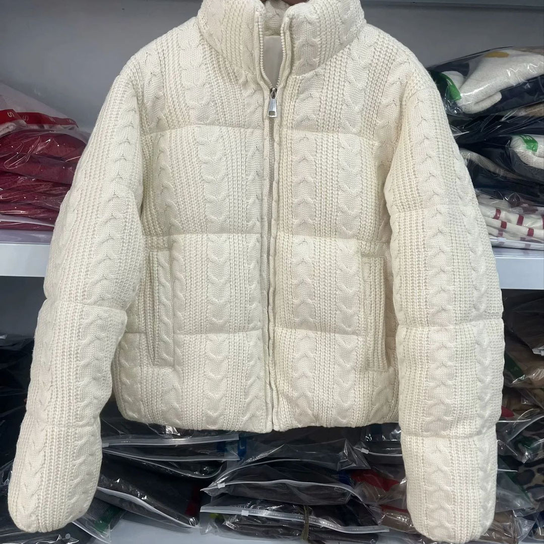 Women's quilted knit jacket with cable knit look, padded thermal filling and high stand-up collar Mune Fashion