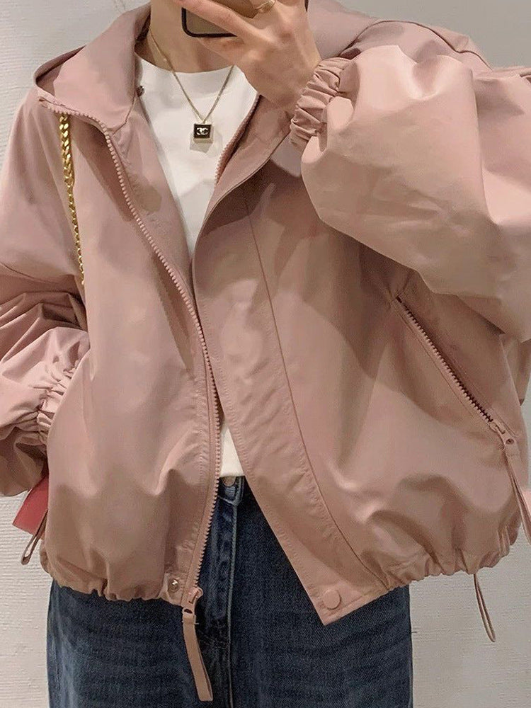 Women's oversized bomber-style hooded jacket with drawstring, elastic cuffs, and side zip pockets Mune Fashion