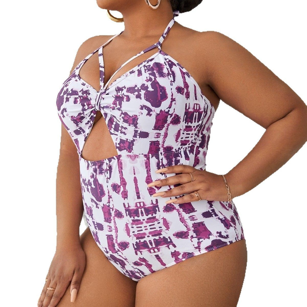 Women's one-piece swimsuit with creative cut-out design and refined strap details Mune Fashion