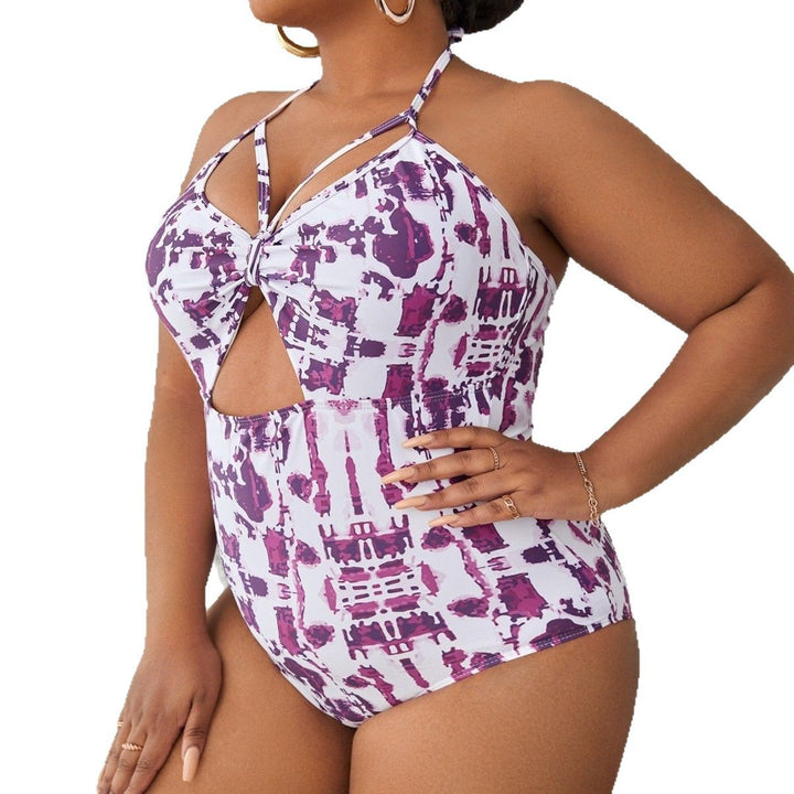 Women's one-piece swimsuit with creative cut-out design and refined strap details Mune Fashion