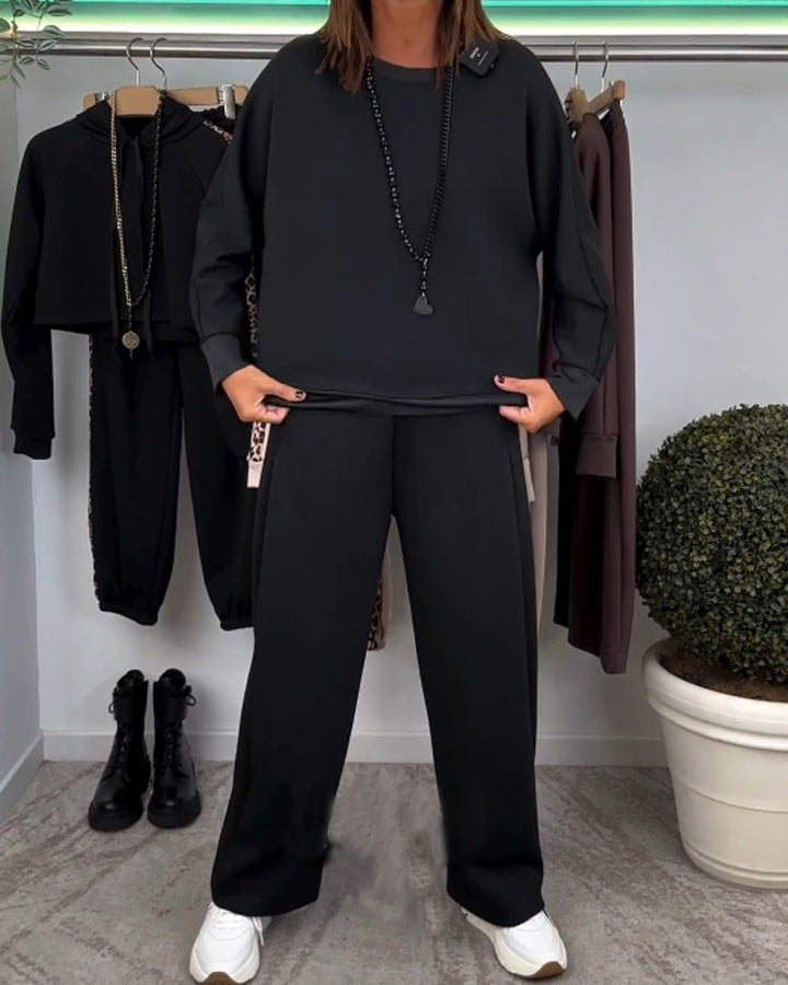 Women’s oversized jogging set with boxy sweatshirt and wide palazzo pants with decorative side stripe Mune Fashion