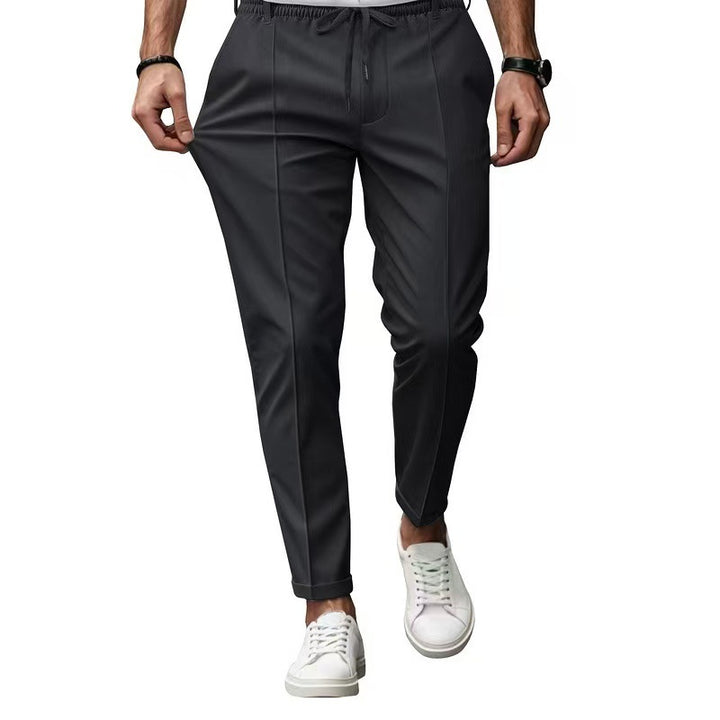 Men's elegant straight-cut chino jogging pants with crease, elastic waistband and drawstring Mune Fashion