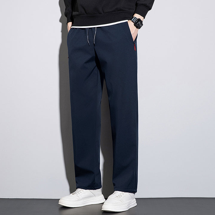 Men's straight-cut leisure and jogging pants with elastic waistband, drawstring, and secure zipper pockets Mune Fashion