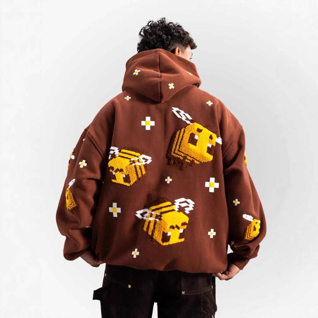 Unisex hoodie with woven pixel bee motif and attached kangaroo pocket Mune Fashion