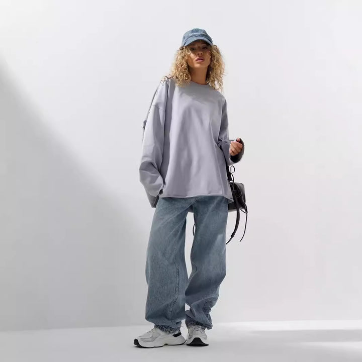 Women's loose sweatshirt with round neckline and extended oversized cut Mune Fashion