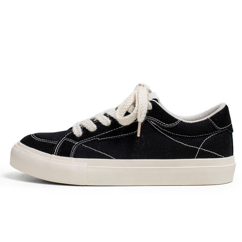 Unisex casual canvas low-top sneaker with contrasting decorative stitching and padded platform sole Mune Fashion