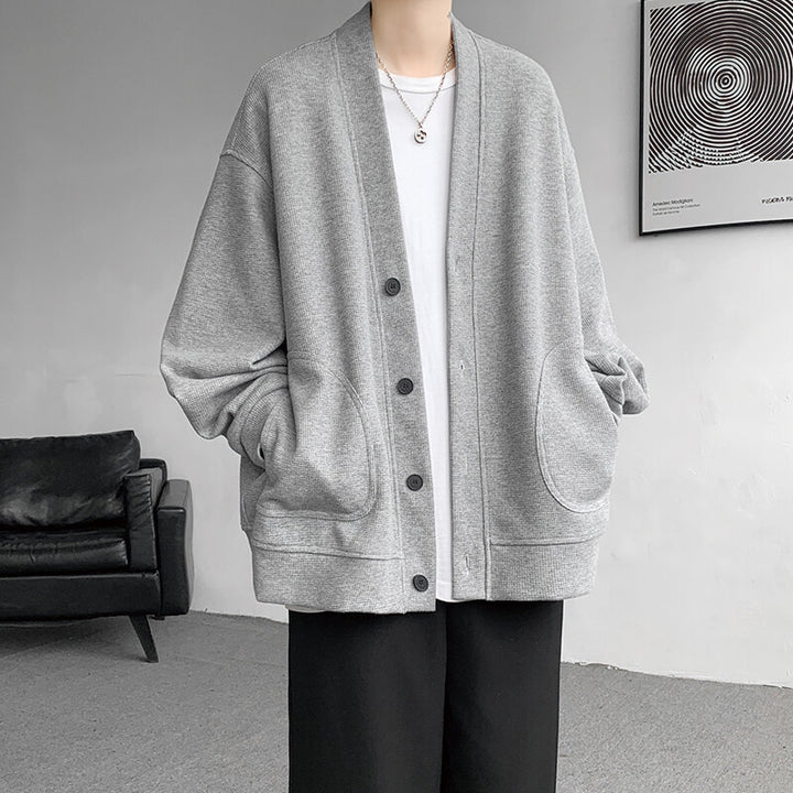 Men's oversized knit cardigan with V-neck, patch round pockets and casual drop shoulder silhouette Mune Fashion