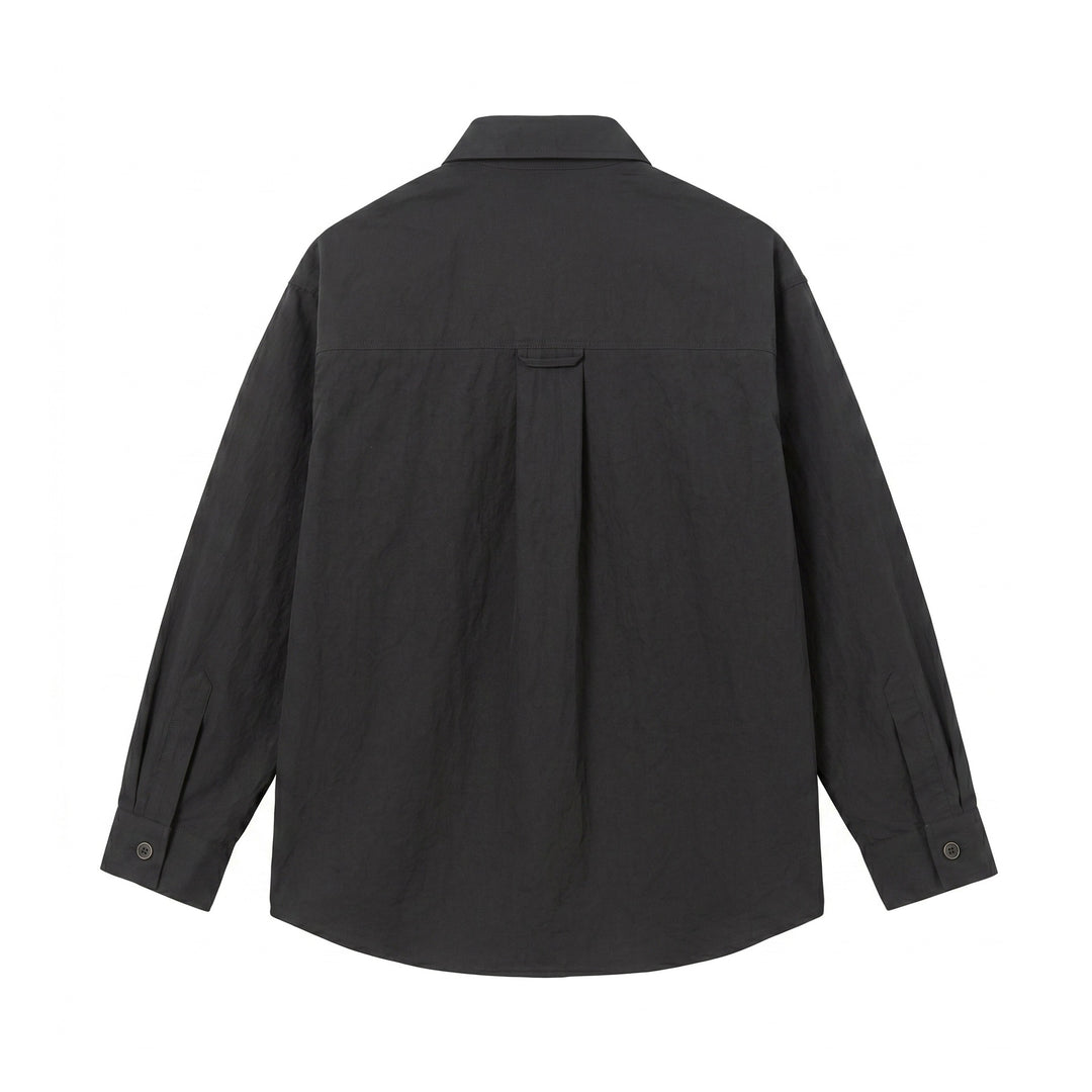 Men's utility shirt jacket with an oversized fit, patch pockets, and concealed button placket Mune Fashion