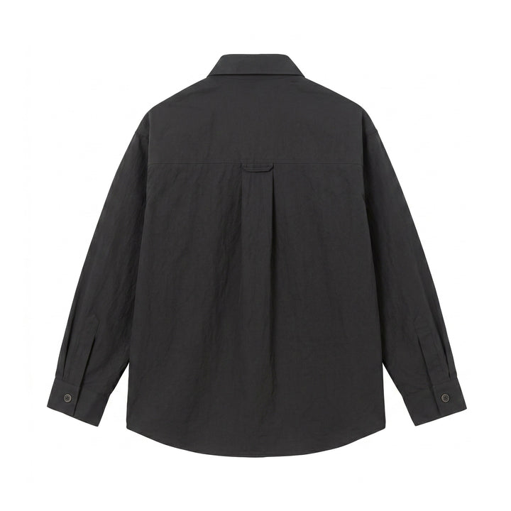 Men's utility shirt jacket with an oversized fit, patch pockets, and concealed button placket Mune Fashion