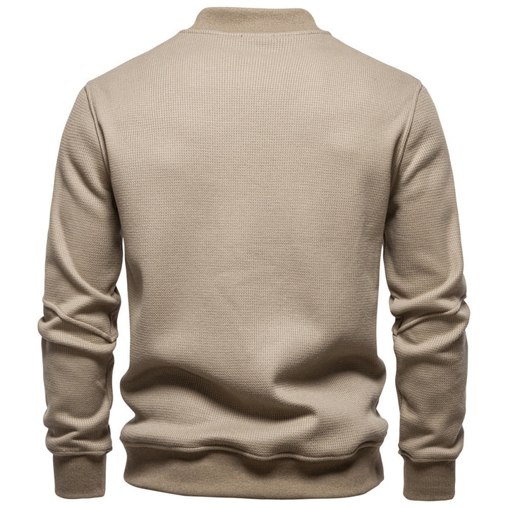 Men's waffle texture Henley pullover with short snap button closure and ribbed cuffs Mune Fashion