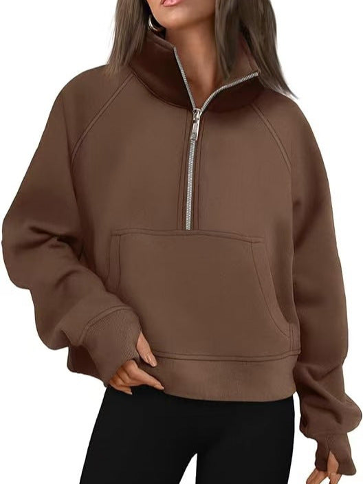 Women's oversized sweatshirt with half zipper, kangaroo pocket, and thumb holes Mune Fashion