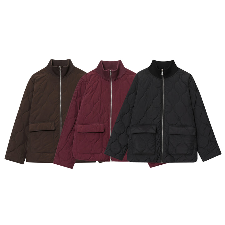 Women's lightweight quilted jacket with round quilting, high ribbed collar, and patch flap pockets Mune Fashion