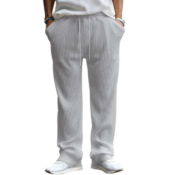 Men's straight cut corduroy velour pants with drawstring waistband, metal drawstring ends, and deep side pockets Mune Fashion