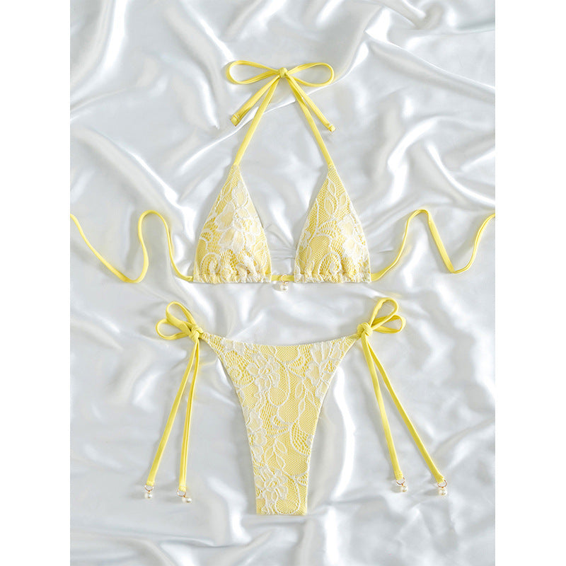 Ladies triangle bikini with fine lace pattern and playful bow detail Mune Fashion