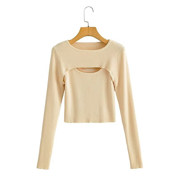 Women short cut ribbed knit top with asymmetric cut-outs and round neckline Mune Fashion