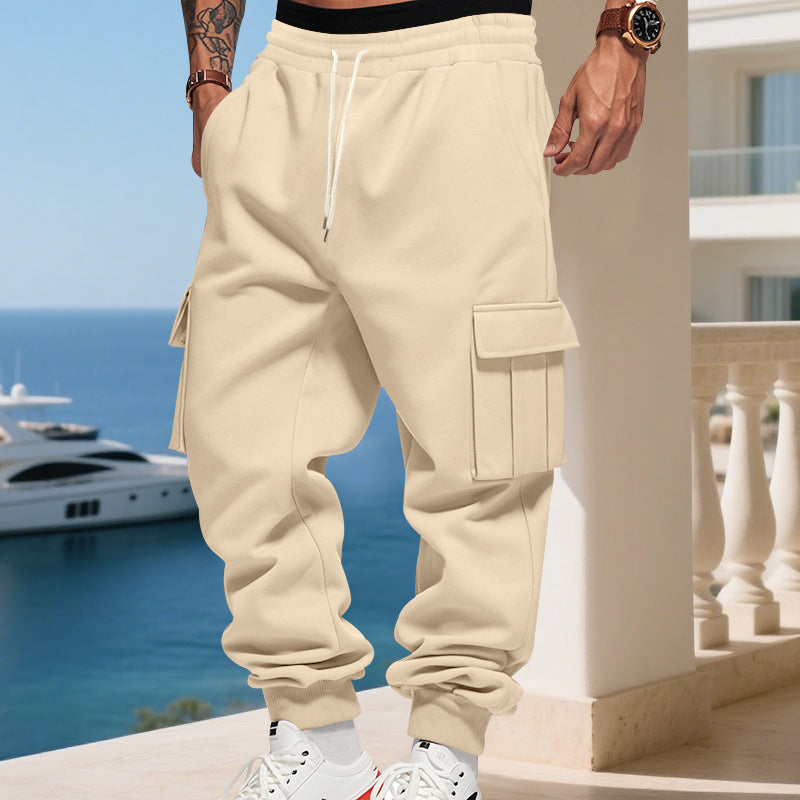 Men's cargo jogging pants with generous flap pockets, elastic waistband, and ribbed cuffs
