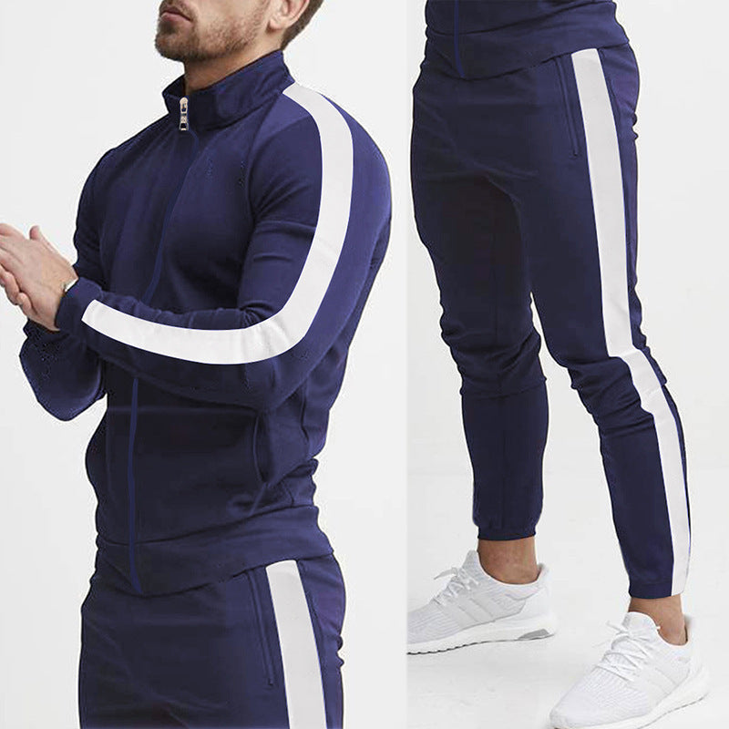Men's fitted sports outfit with stand-up collar, full-length zip and tapered sports pants with side stripes Mune Fashion