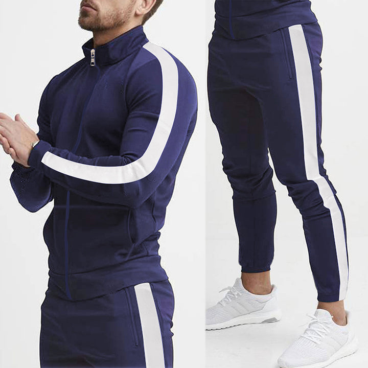 Men's fitted sports outfit with stand-up collar, full-length zip and tapered sports pants with side stripes Mune Fashion
