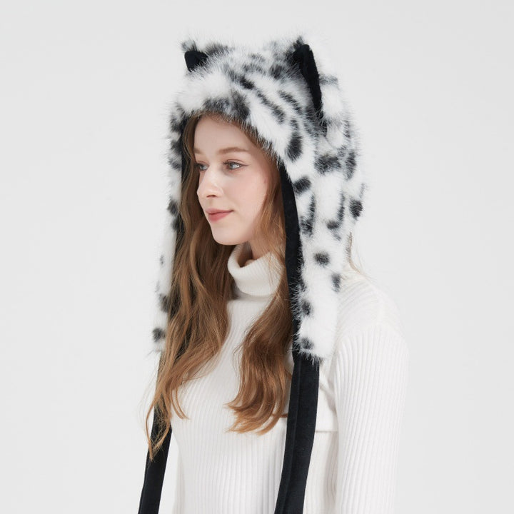 Ladies hooded stole made of luxurious faux fur with long scarf tails and pompom ends Mune Fashion