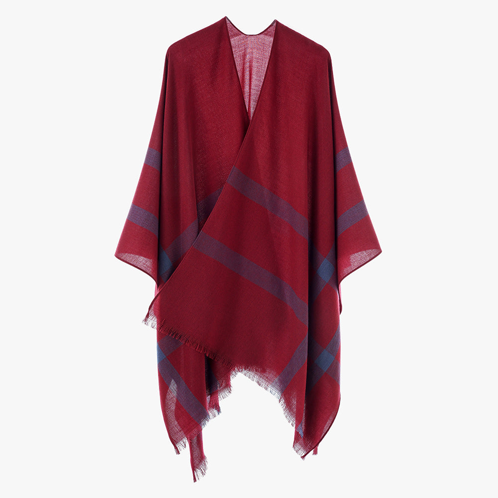 Women’s lightweight fine knit cape with diagonal contrasting stripes and fringes Mune Fashion