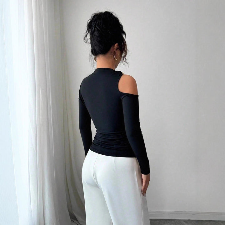 Women's one-sided cutout fitted long-sleeve top with decorative shoulder ring Mune Fashion