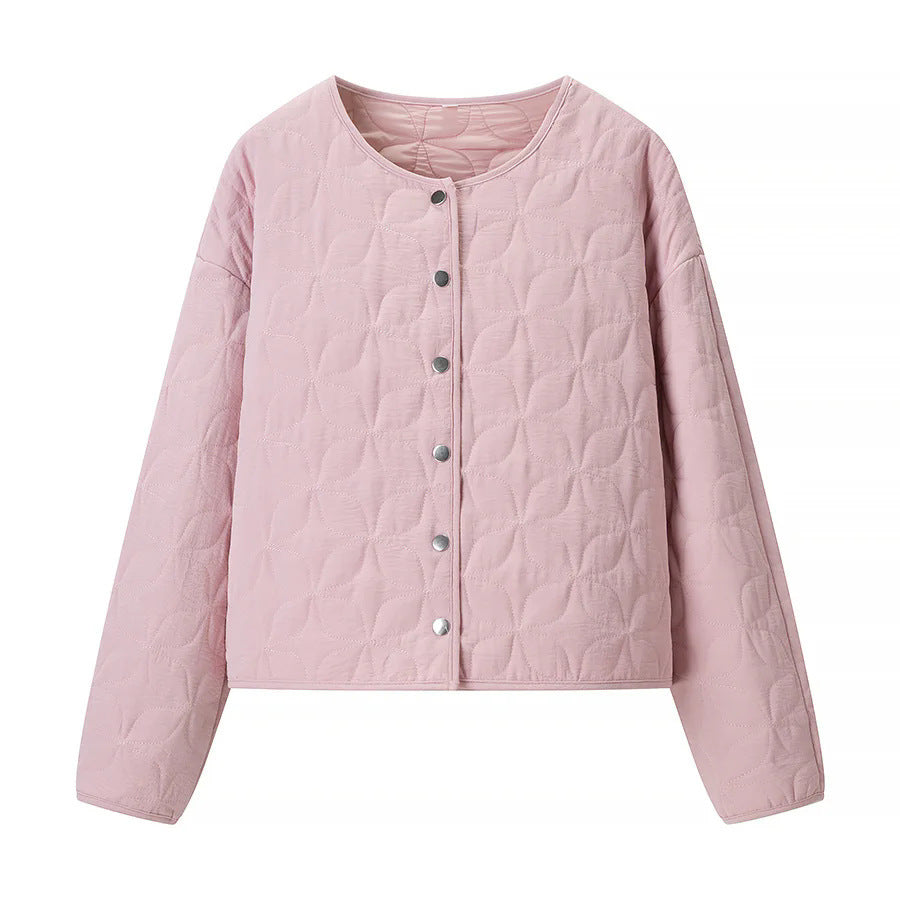 Women's quilted boxy transitional jacket with floral quilted texture, lightly padded inner lining and press stud placket Mune Fashion