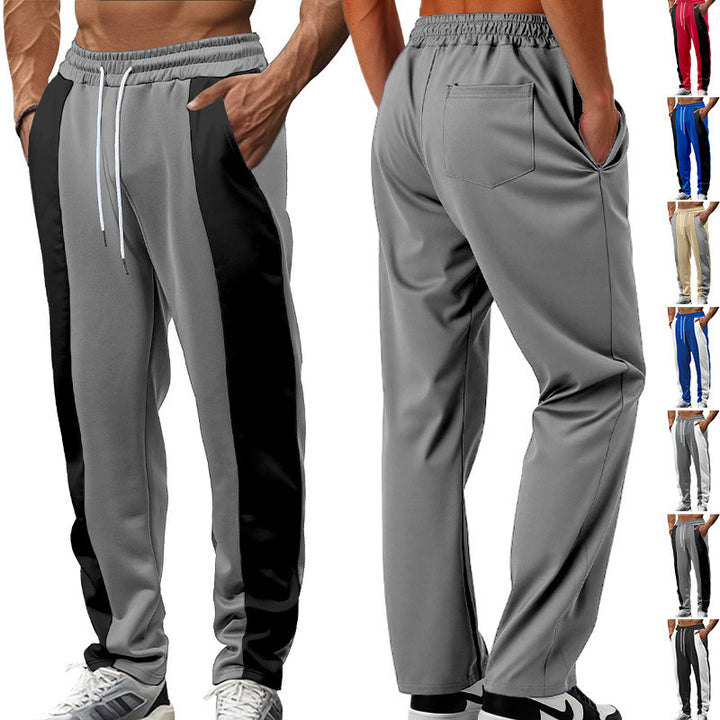 Men's sporty track pants with side contrast stripes, elastic waistband, drawstring, and deer embroidery Mune Fashion