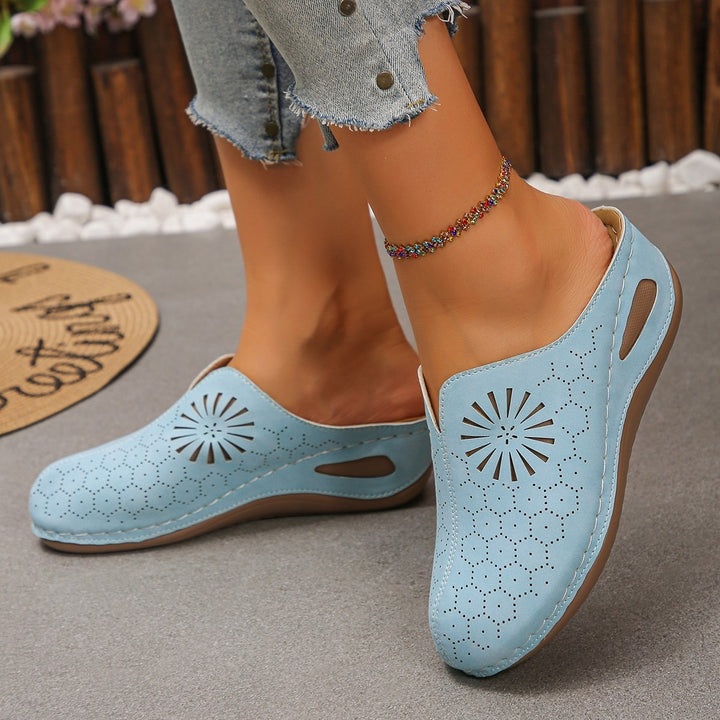 Women Comfortable Perforated Slipper Mules with Floral Cutouts and Padded Footbed Mune Fashion
