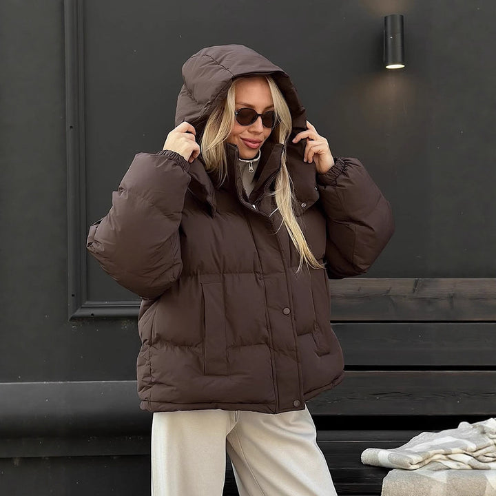 Women's short-cut oversized quilted jacket with high stand-up collar and concealed snap button placket Mune Fashion