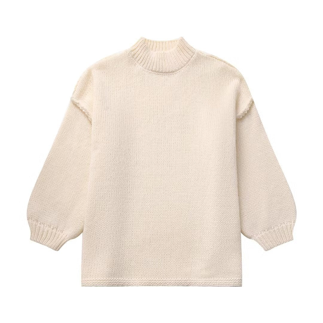 Women's chunky knit sweater with standing collar, dropped shoulders, and balloon sleeves Mune Fashion